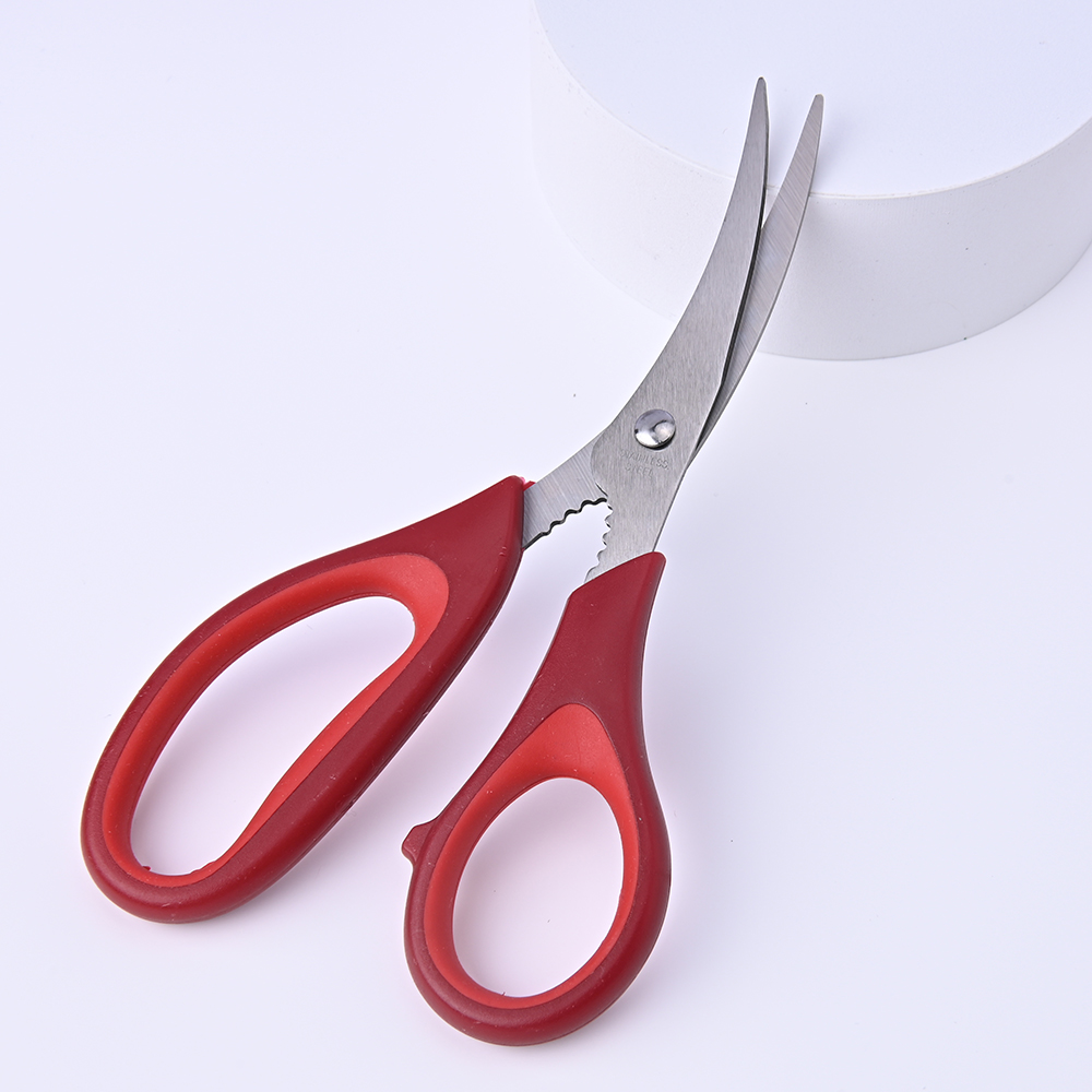 Multipurpose kitchen scissors, red handle